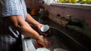 Ellizabeth Rantoetse at her sink