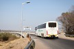 An overland bus crosses the bridge