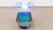 Drone connected to a ground robot