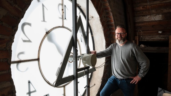 Mayor Claus Madsen in the clock tower of the city hall in Rostock