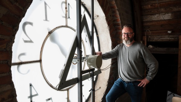 Mayor Claus Madsen in the clock tower of the city hall in Rostock