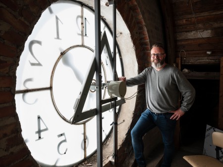 Mayor Claus Madsen in the clock tower of the city hall in Rostock