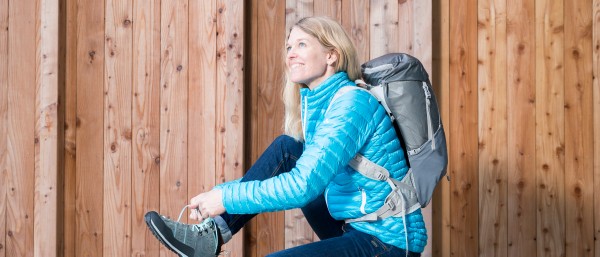 Antje von Dewitz, managing director of Vaude, ties her shoe